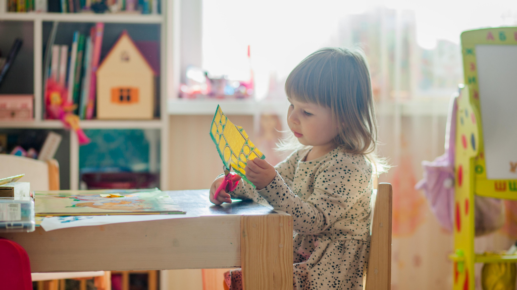 child cutting paper child cutting paper