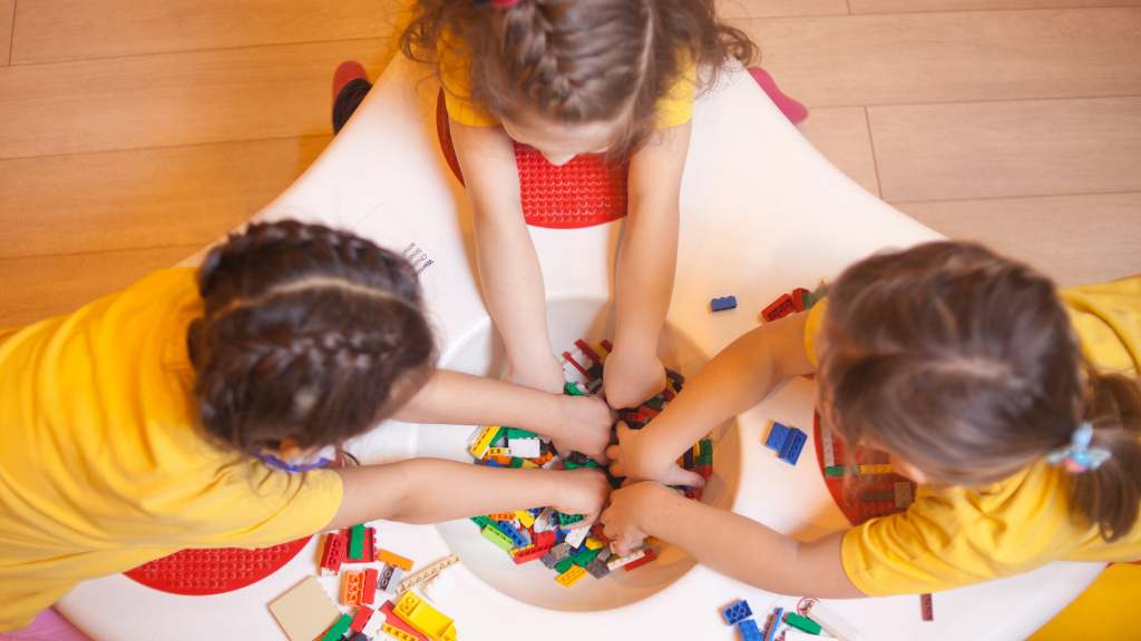construction play2 children playing with lego