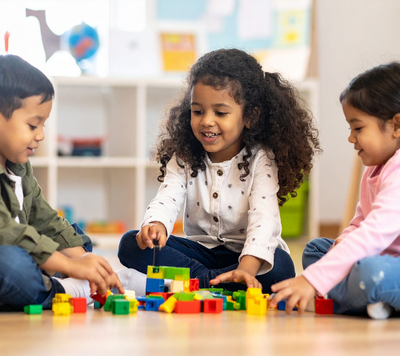 children playing with lego together