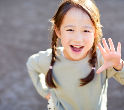 child happy and smiling in childcare