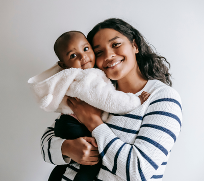 mum and baby smiling