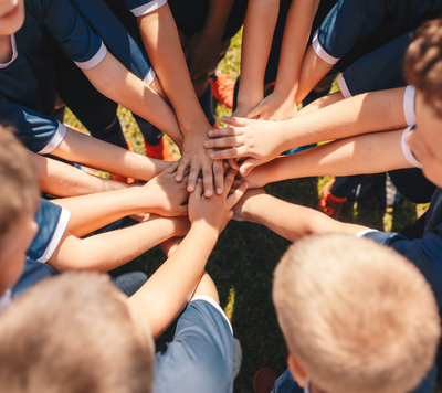 Athletics children having teamwork to play athletics