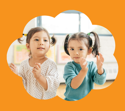 girls clapping and dancing at childcare
