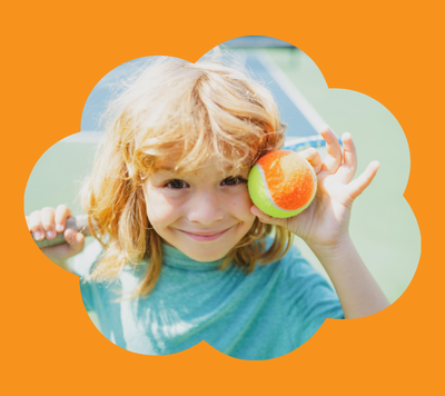 child holding tennis ball to play sports