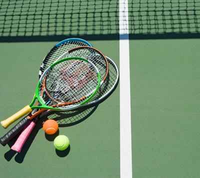 Tennis tennis racquets and tennis balls on court