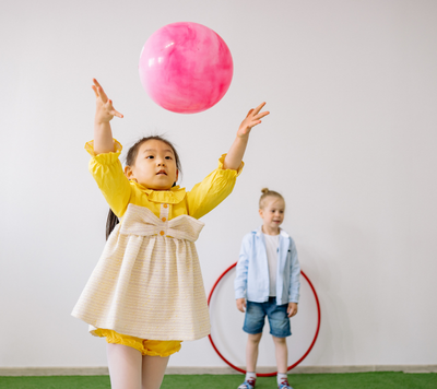 Child playing with ball Child playing with ball